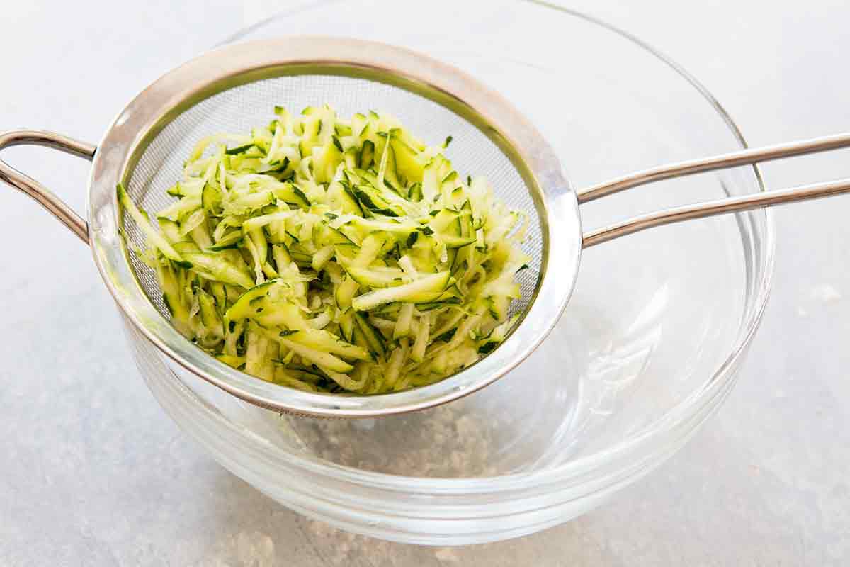 Zucchini quiche grate and drain the zucchini