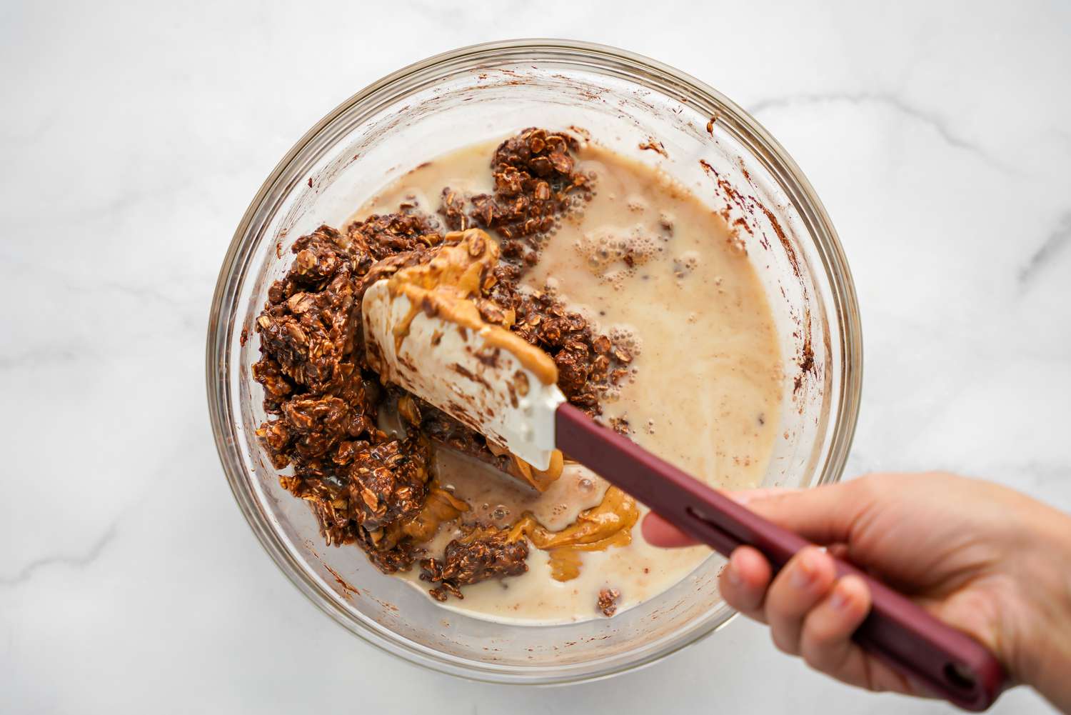 Wet Ingredients (Peanut Butter, Almond Milk, etc) Mixed with Dry Ingredients for Vegan Oatmeal Brownie Recipe