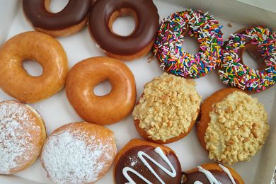 overhead view of box of a dozen donuts