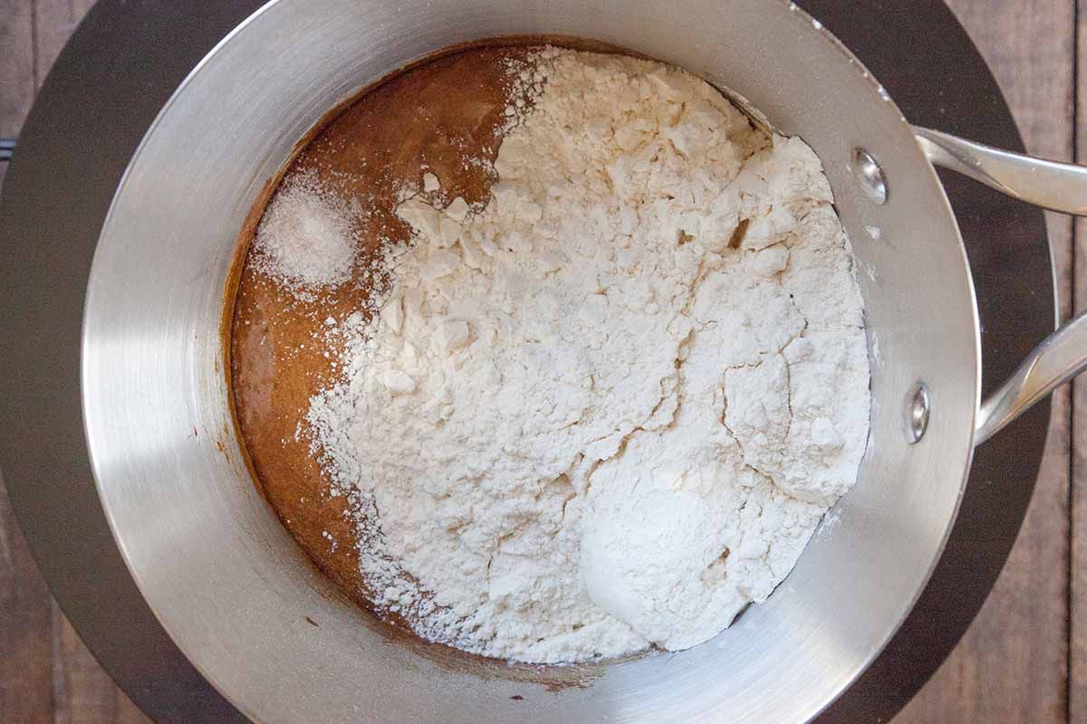 adding flour Pfeffernüsse Spice Cookie batter