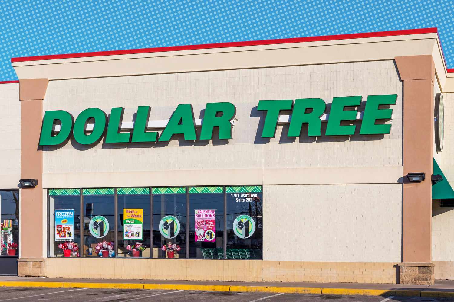 The storefront of a Dollar Tree retail store with visible signage and promotion posters on the windows