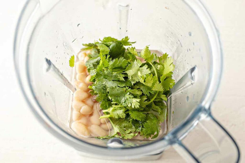 Blend the white beans and cilantro to a puree for green chili soup