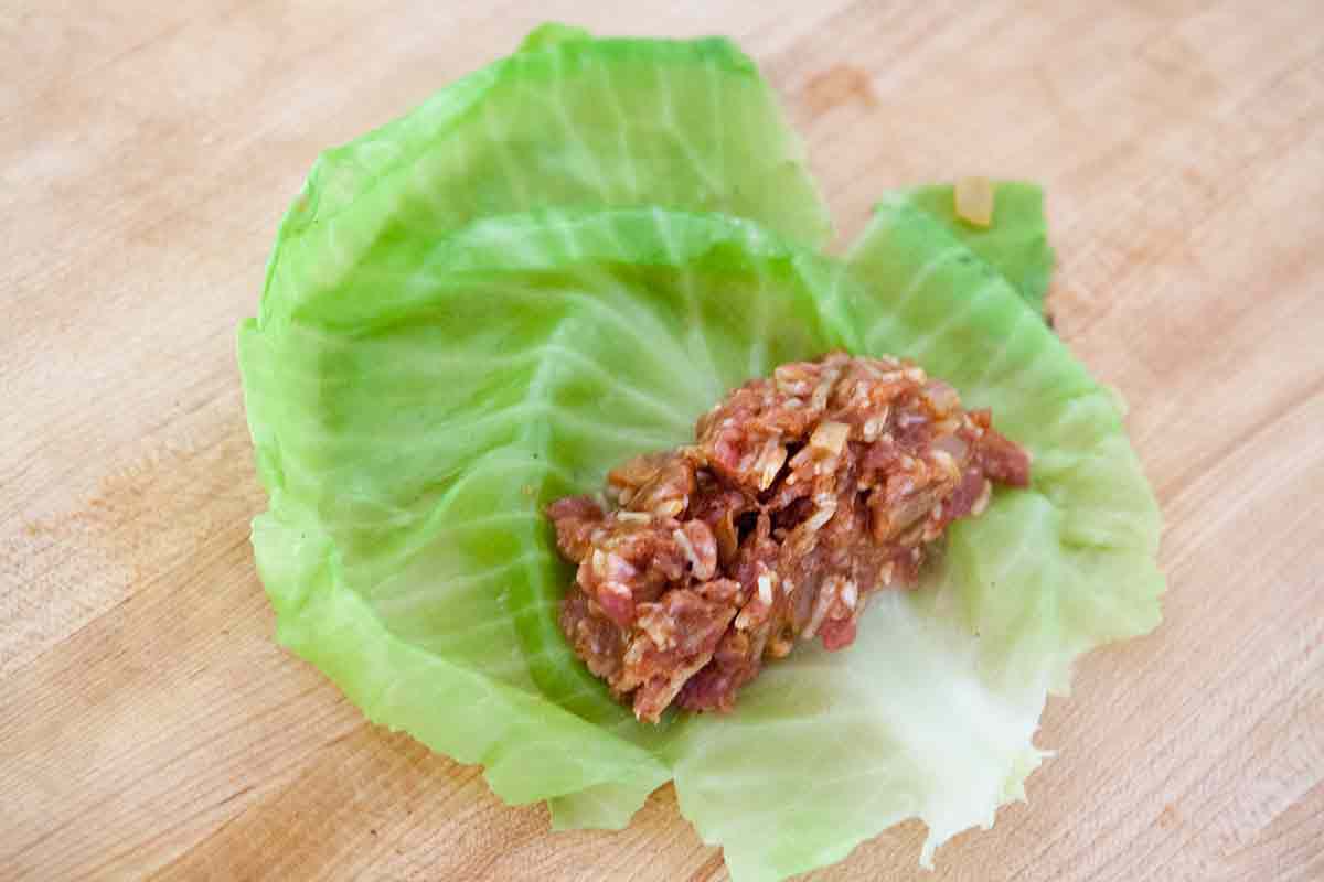 place pork stuffing in cabbage for stuffed cabbage rolls