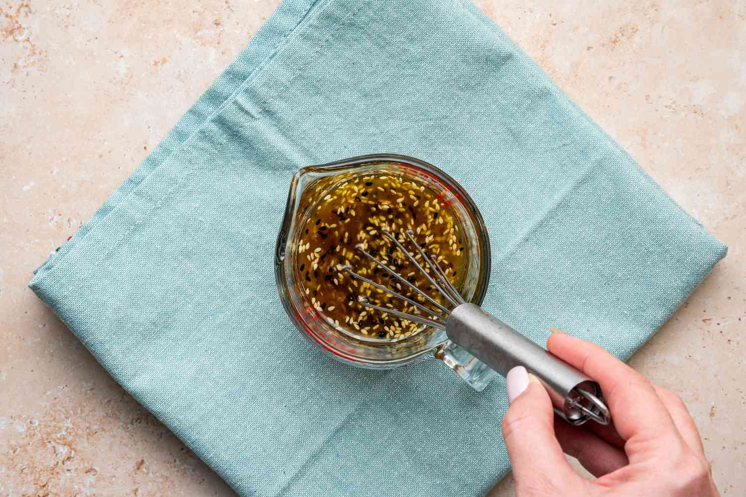 The Rest of the Sesame Dressing Ingredients Whisked into the Pyrex Measuring Cup for Broccoli in the Microwave Recipe 