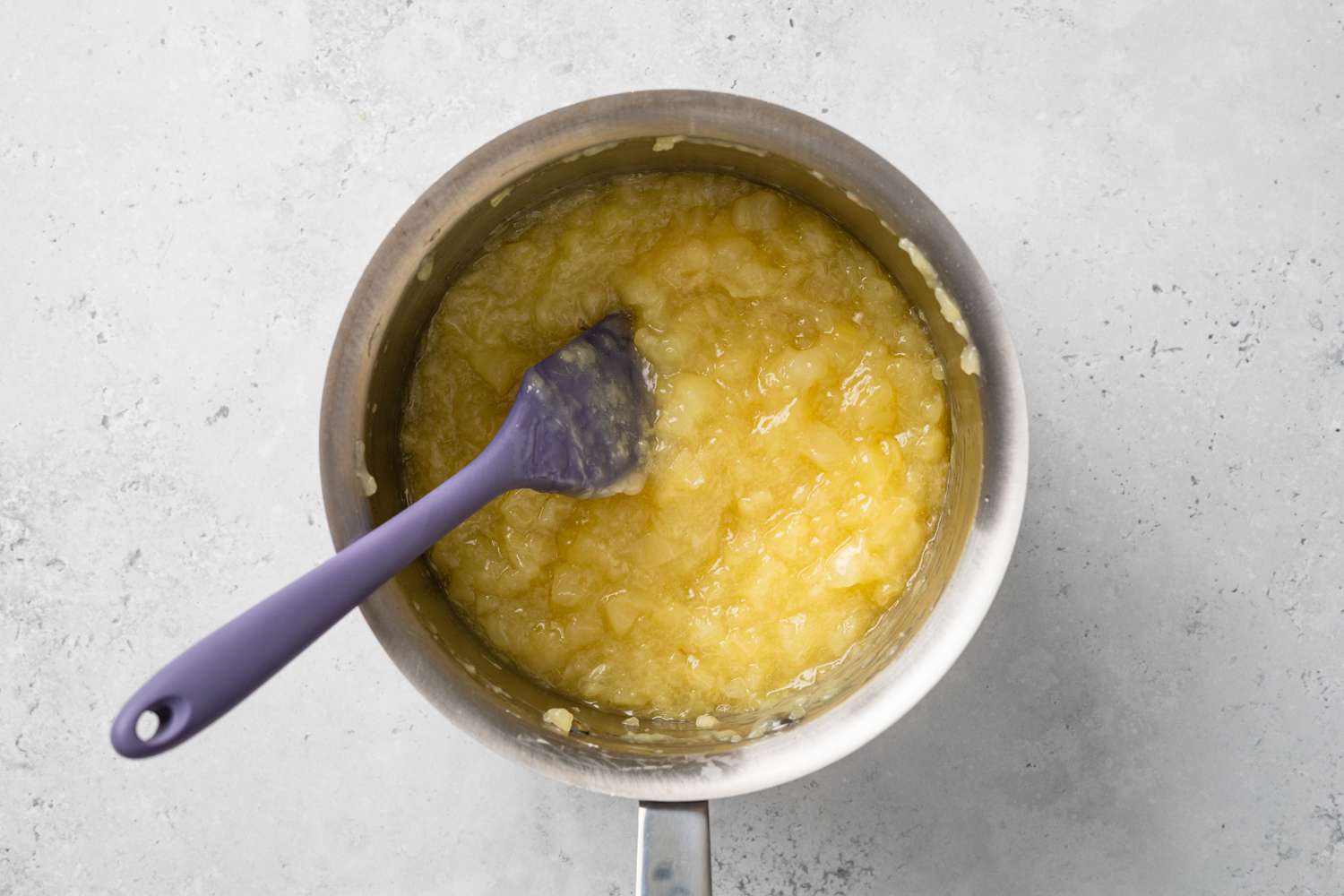 Crushed Pineapple Mixture Stirred in a Small Sauce Pan