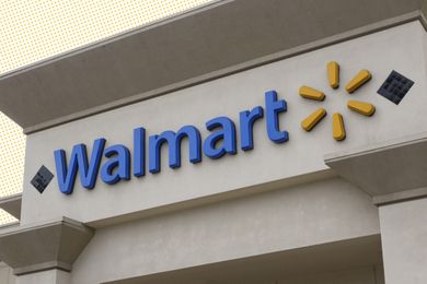 Exterior view of a Walmart store with its logo and signage visible on the building