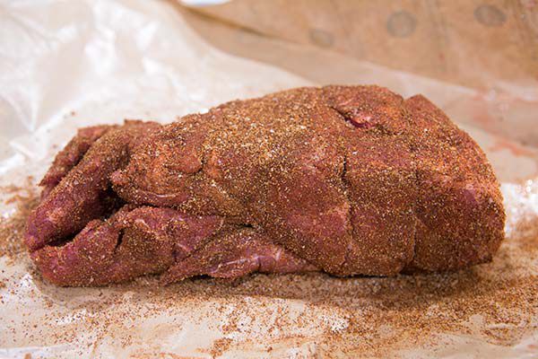 slow cooker pork tacos - preparing meat with spice mix 