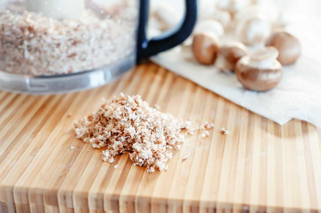 Finely dice mushrooms in a food processor