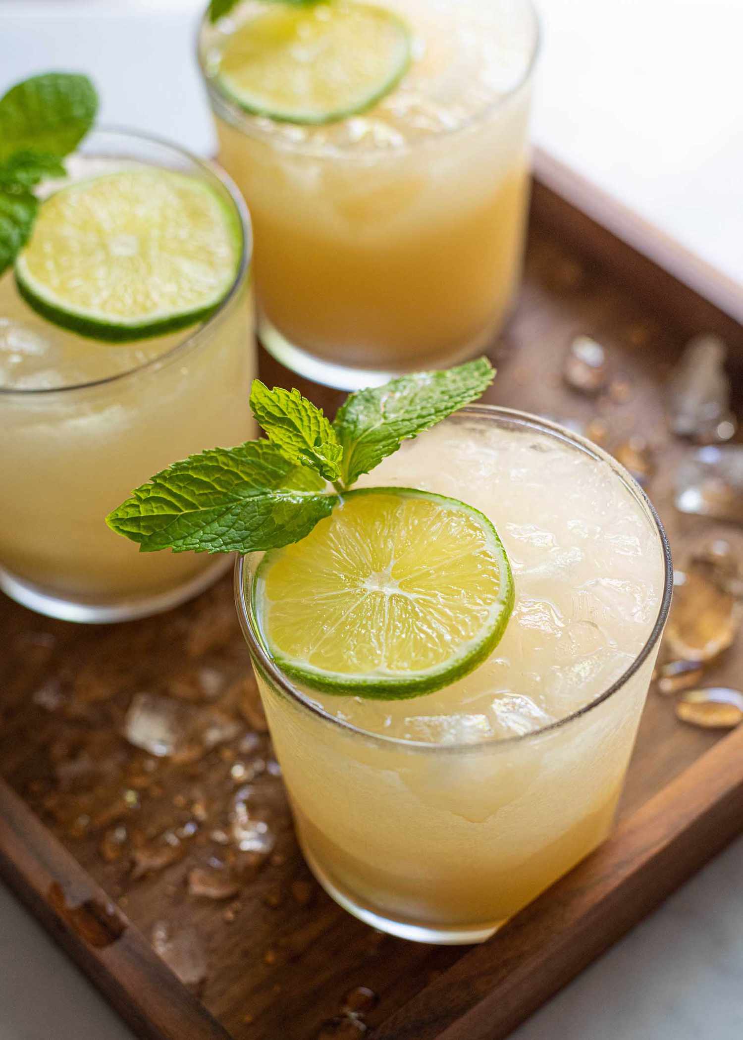 Mai Tai Cocktail - peach drink with ice and lime