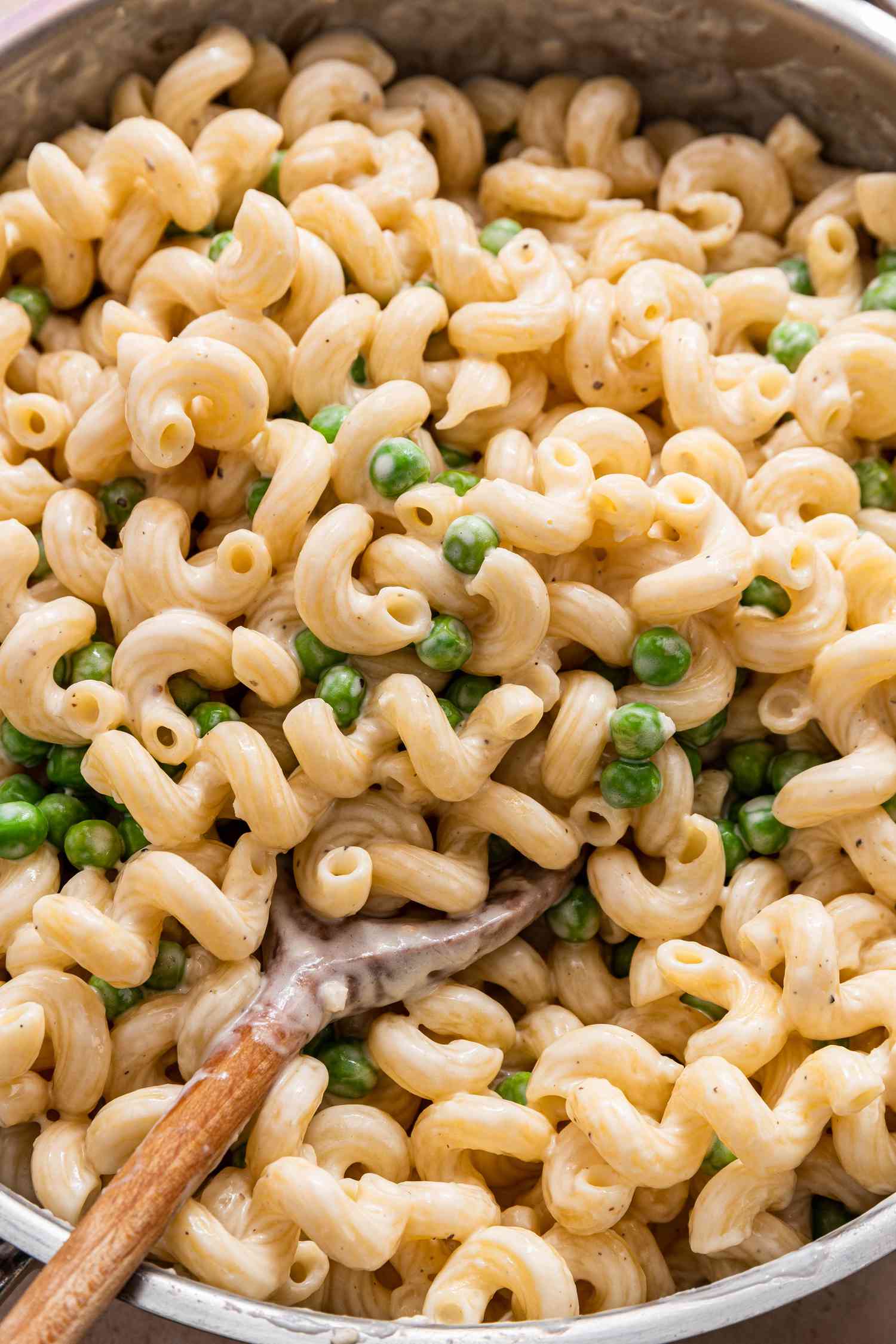 Pot of Creamy Cavatappi With a Wooden Spoon