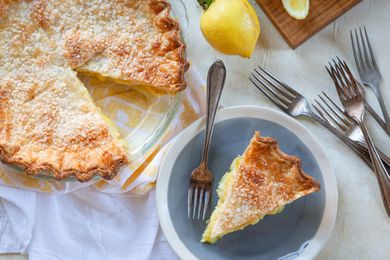 6 Ingredient Lemon Pie with a slice on a plate.