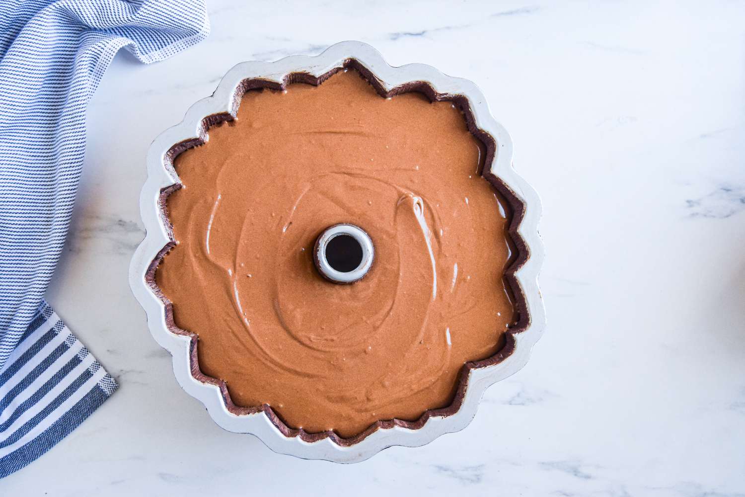 Chocolate Bourbon Cake batter in a bundt pan, ready to bake