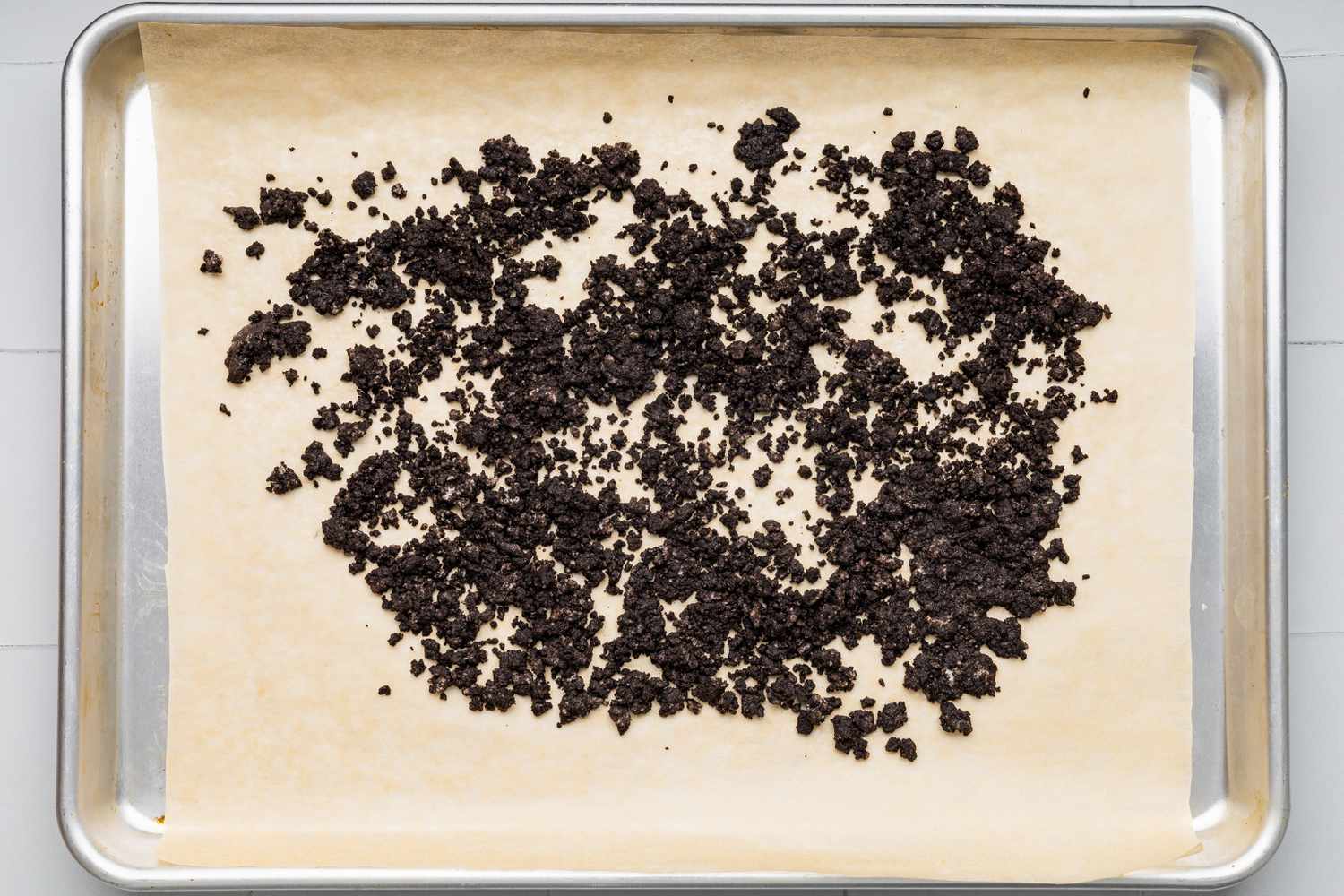 Making the Crunchies: Crushed Cookie Crumbs on a Parchment Paper Lined Baking Tray