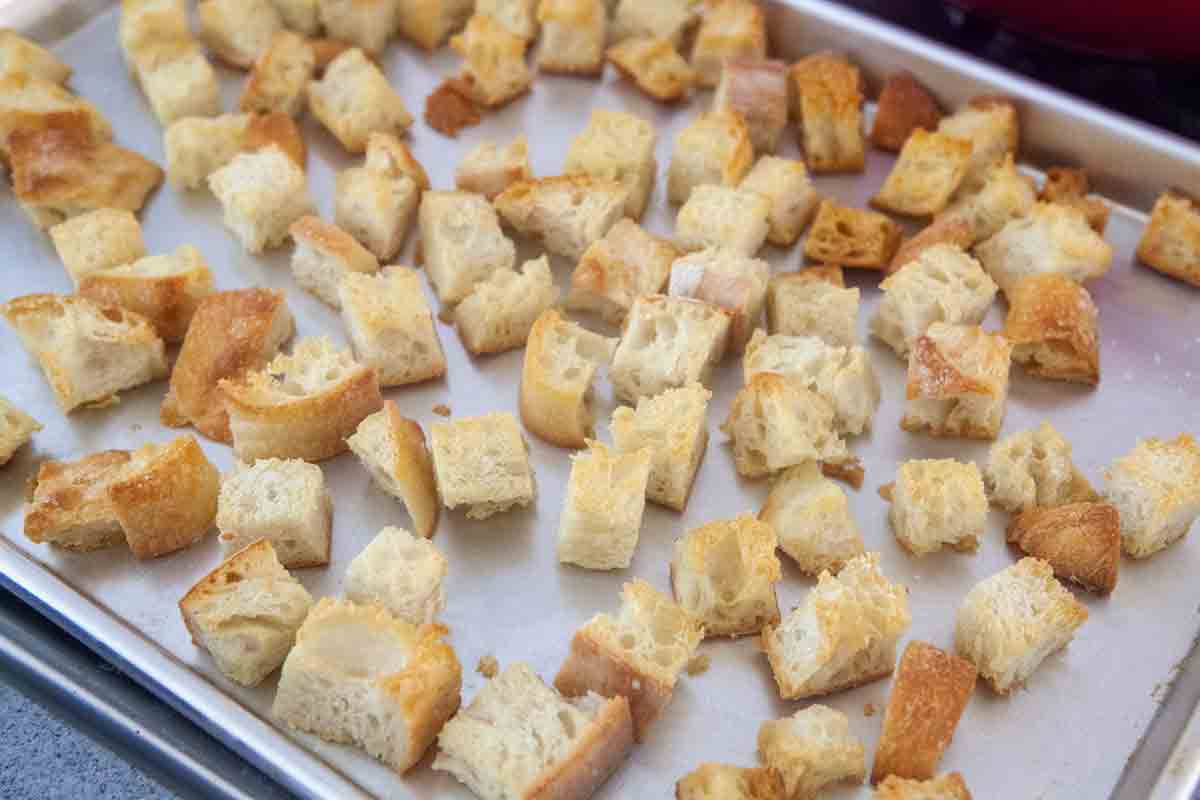 toasted cubed bread on baking sheet for panade