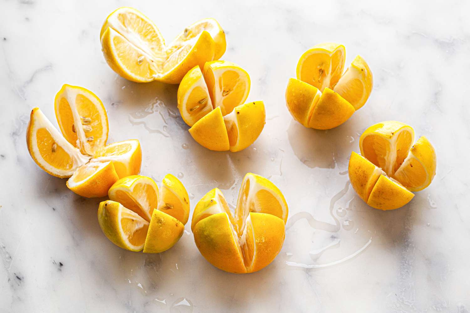 Lemons Cut in Quarters (Bottoms Still Attached) For Preserved Lemons