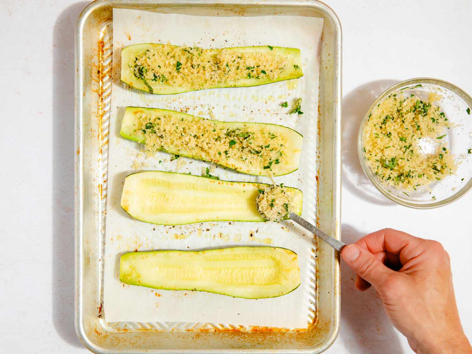 zucchini boats covered with herbed parmesan mixture 