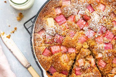 Almond Flour Cake Recipes - rhubarb cake in skillet with slice cut