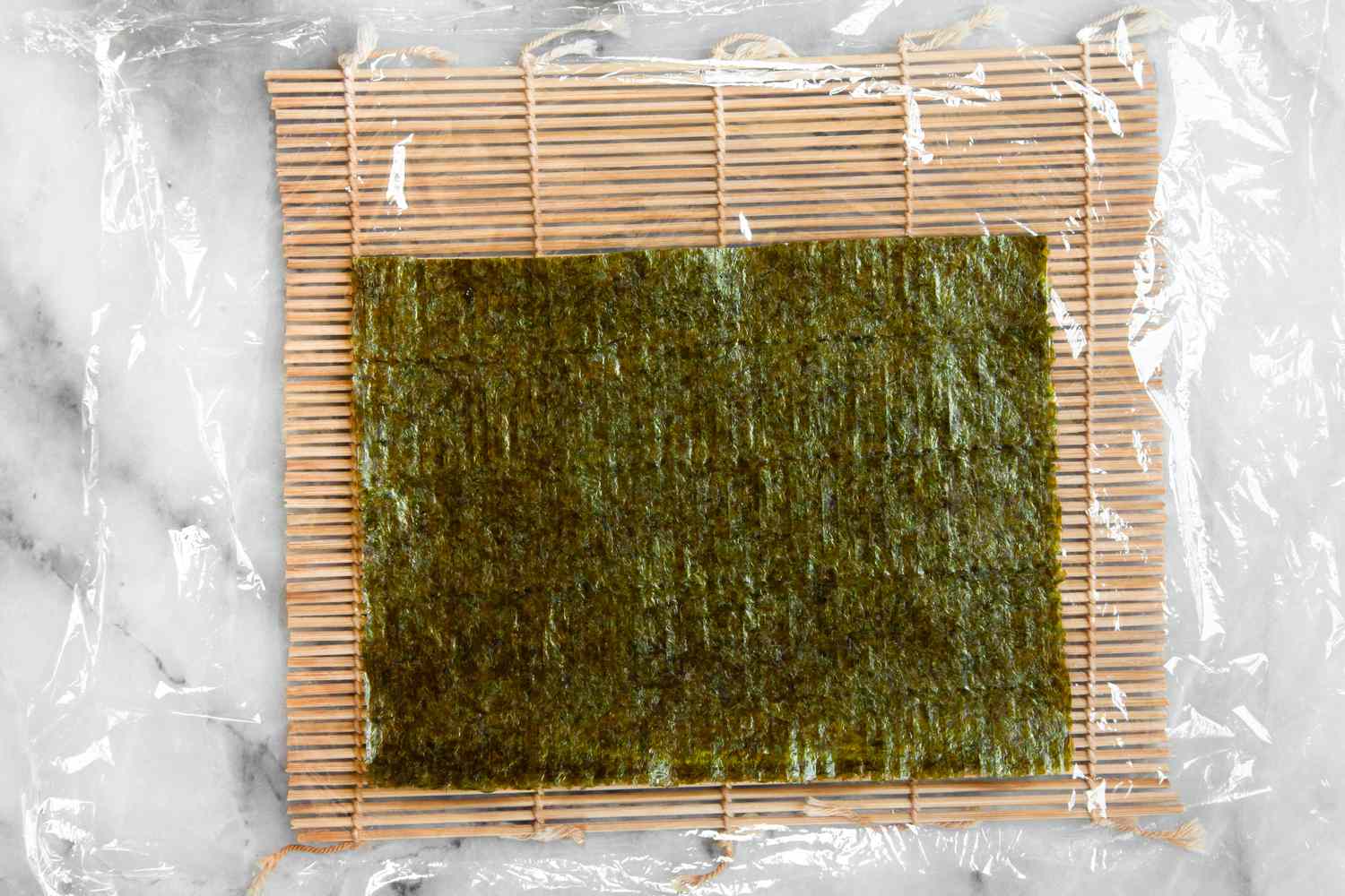 Nori Added to Roller for California Rolls