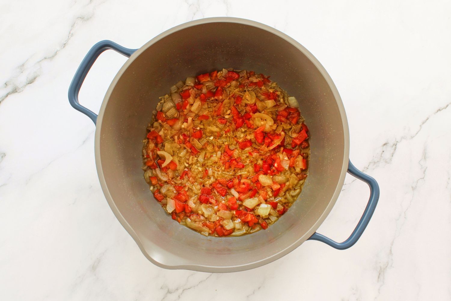 Pulpeta (Cuban Meatloaf) braising liquid in a dutch oven.