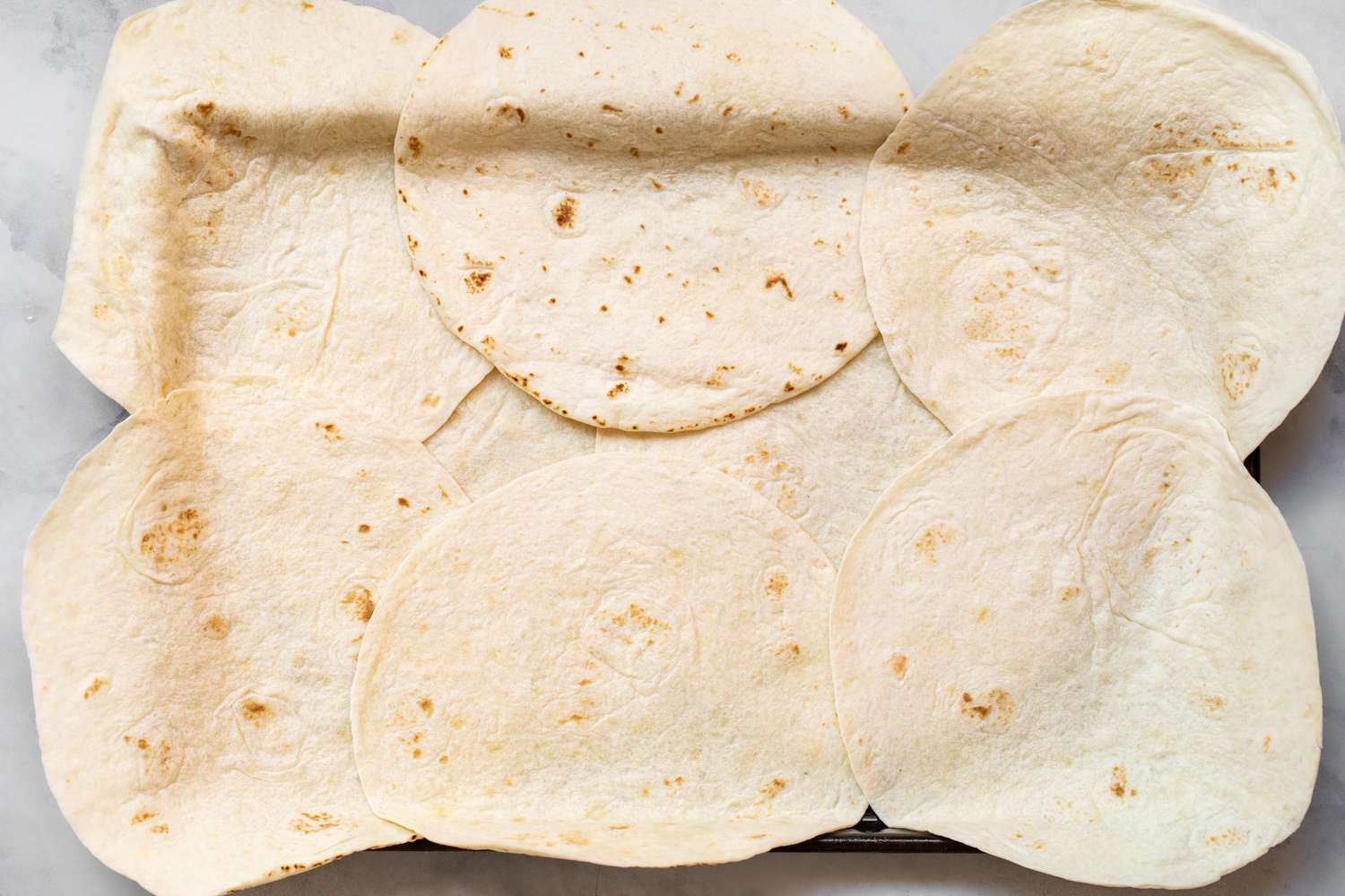 Sheet Pan Lined with Tortillas for Sheet Pan Quesadillas Recipe