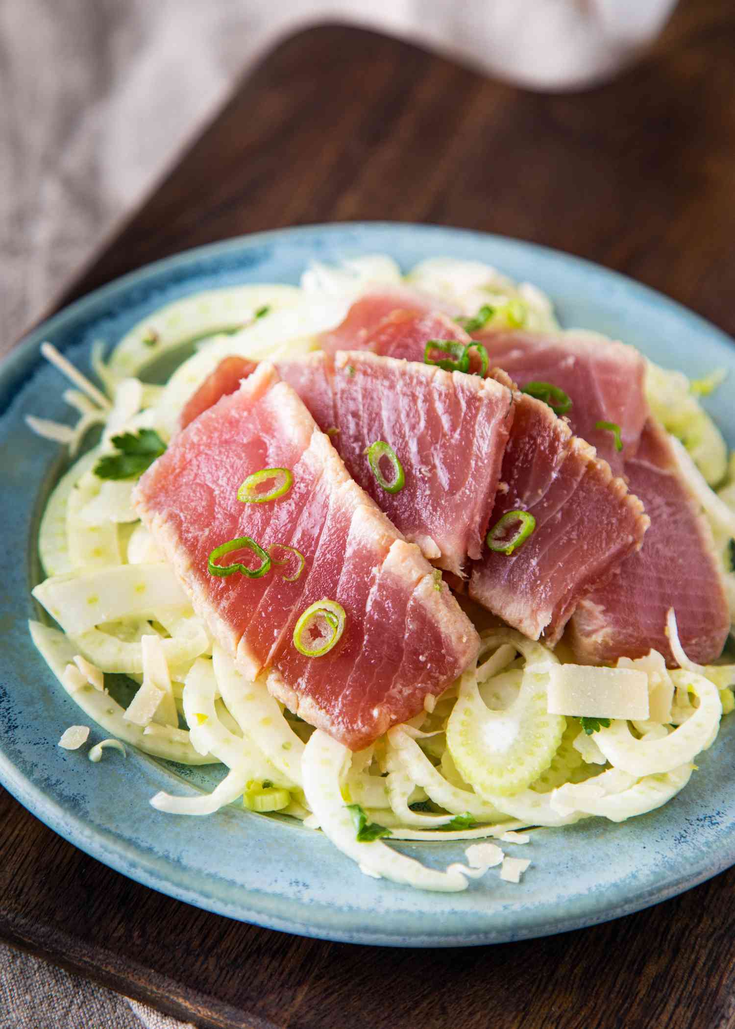 A plate of ahi tuna served over fennel salad.
