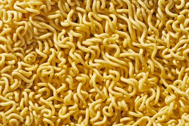 Dry ramen noodles in a closeup view showing their texture
