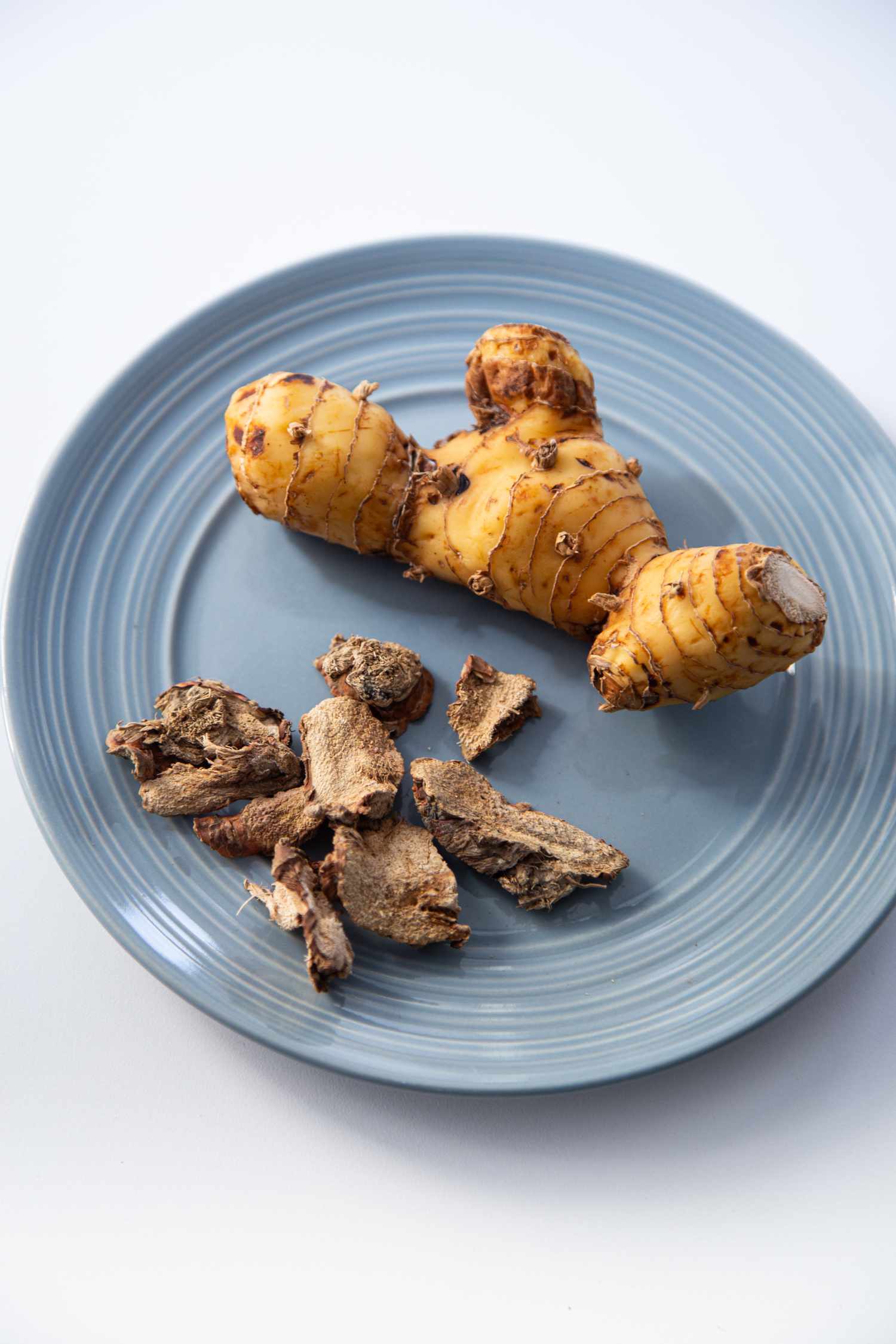 Whole and dehydrated galangal
