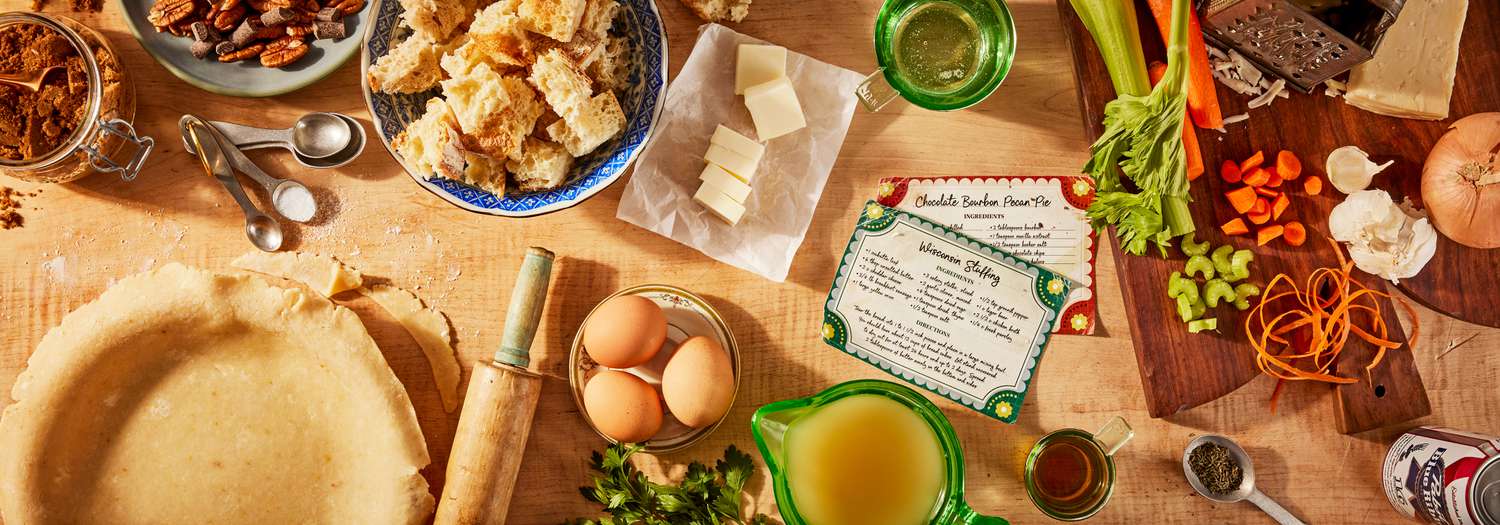 Thanksgiving prep scene with partially assembled pie and ingredients for stuffing