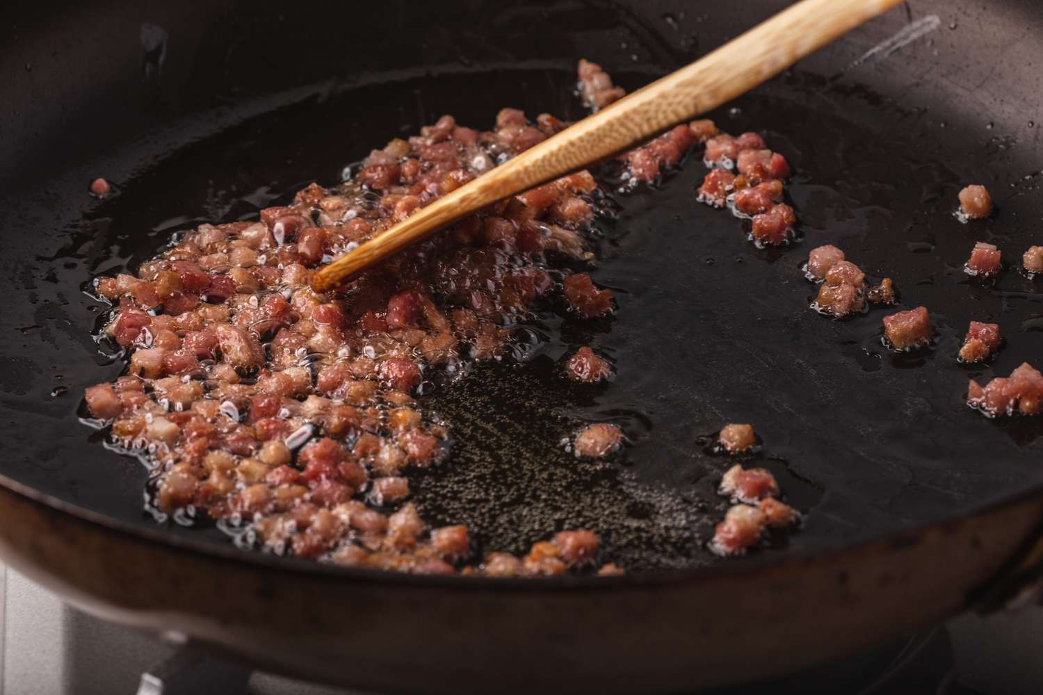Sauteeing pancetta to make an easy chicken marsala recipe.
