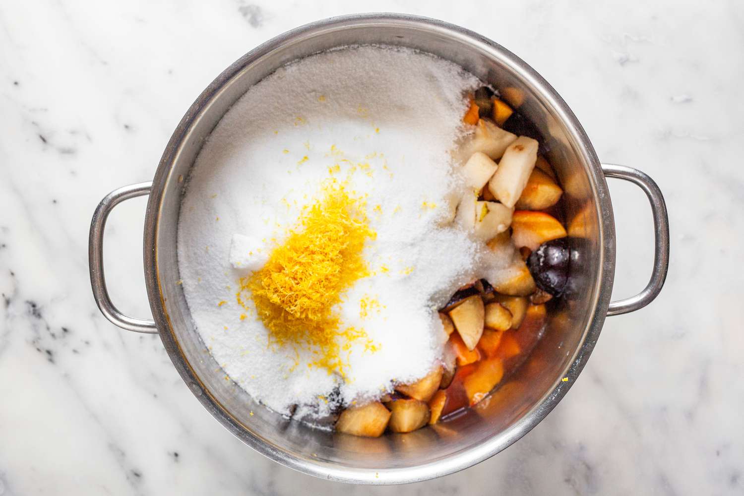 Peach, Pear, and Plum Slices in a Pot with Sugar and Lemon Zest for Jam Recipe