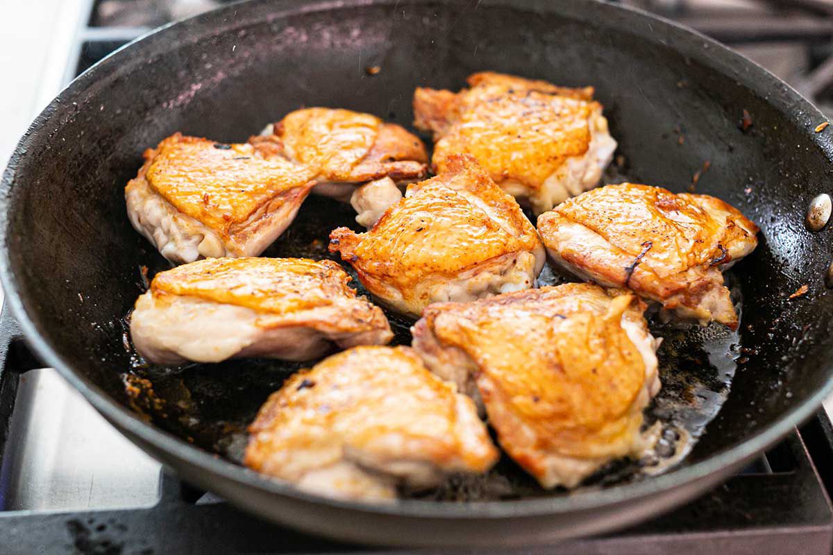 Best Chicken and Rice Casserole brown the other side of the chicken in the pan