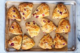 Baked scones on baking sheet.