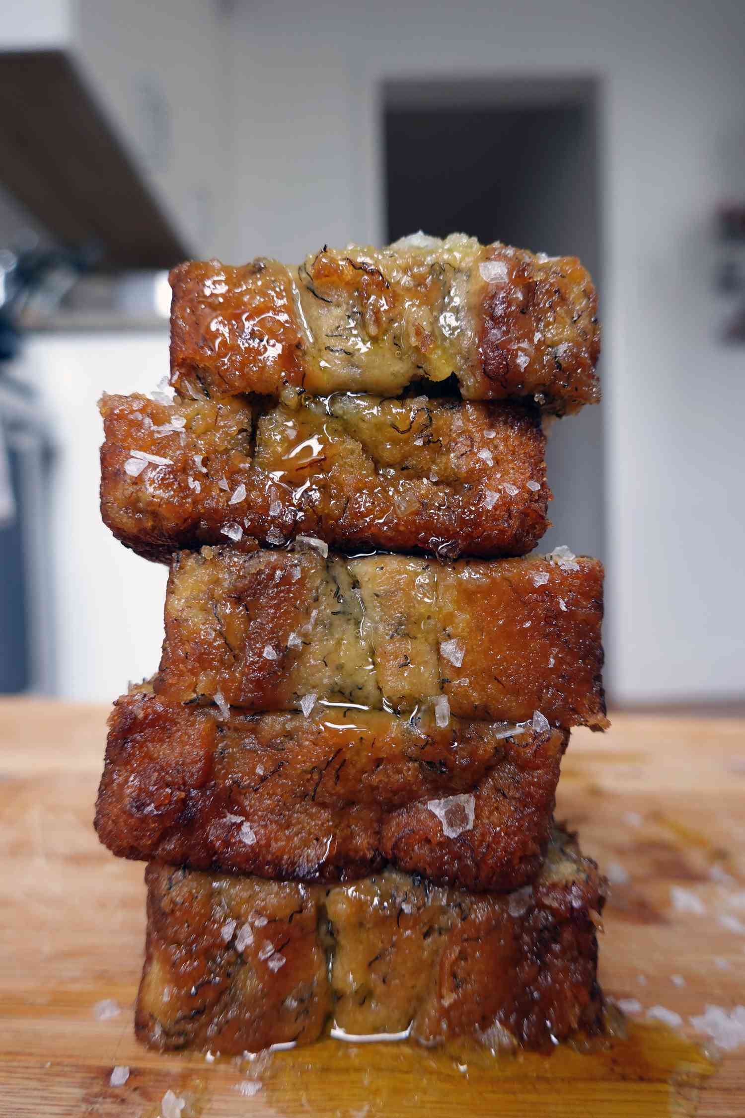 Stacked slices of banana bread with salt