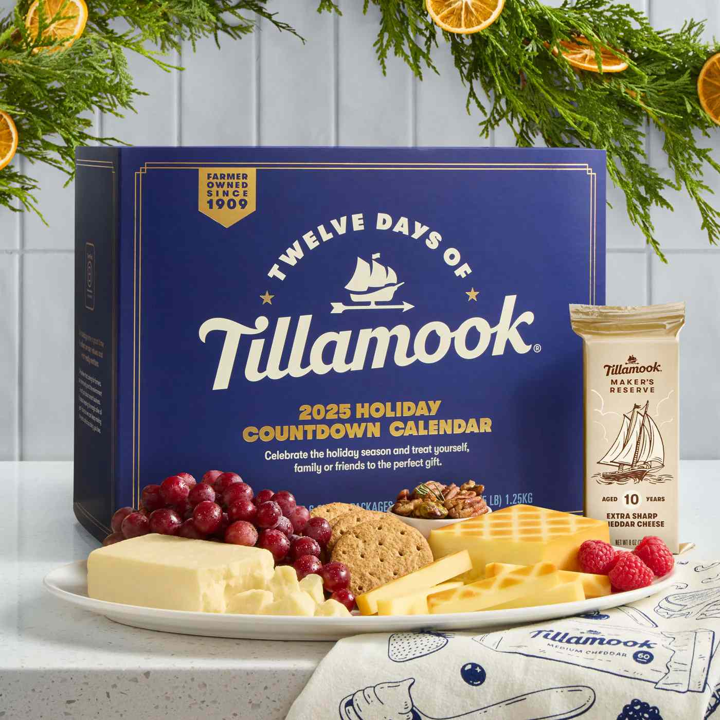 Tillamook holiday countdown calendar with cheese crackers and fruit displayed in front