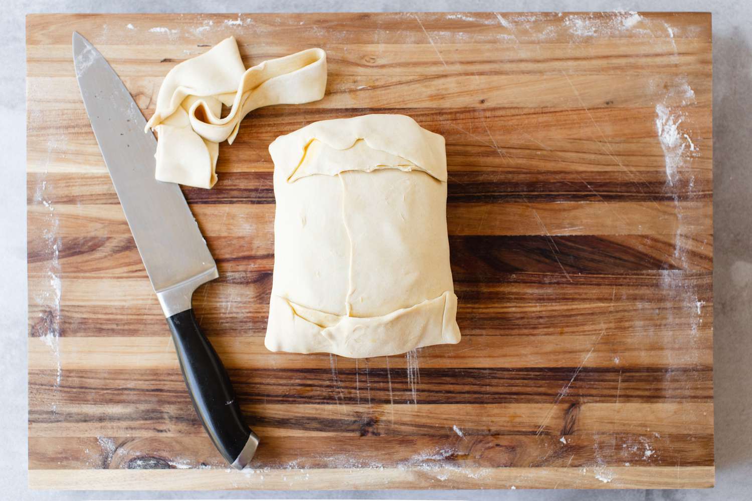 Beef Wellington Wrapped in Puff Pastry and Excess Puff Pastry Trimmed Off