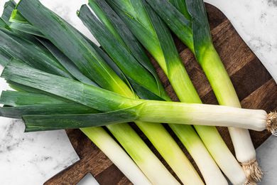 Leeks on a Cutting Board on a Counter