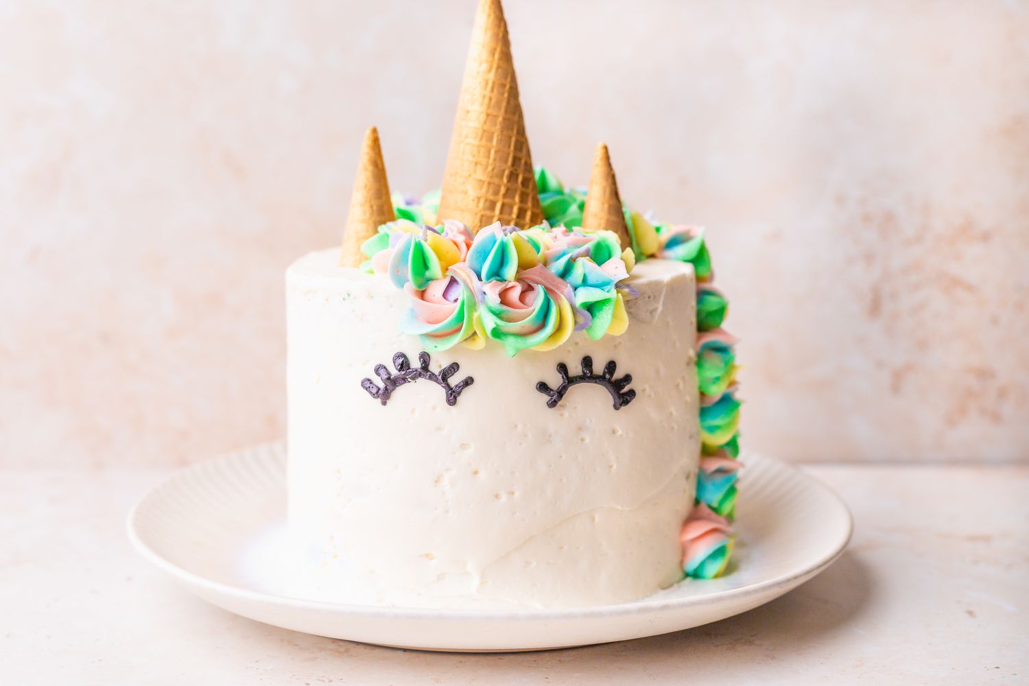 Black Eyelashes Added to Unicorn Cake 