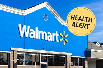 Exterior of a Walmart store health alert sign overlay