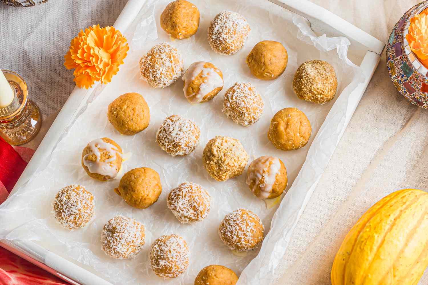 Pumpkin Ladoo on a Tray with Flowers