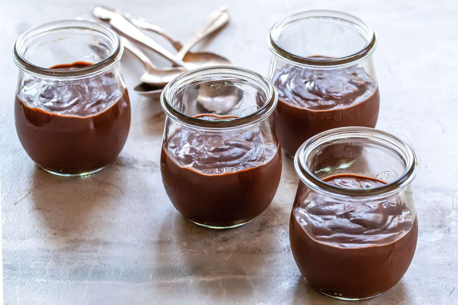 Cups and spoons to eat homemade pudding.