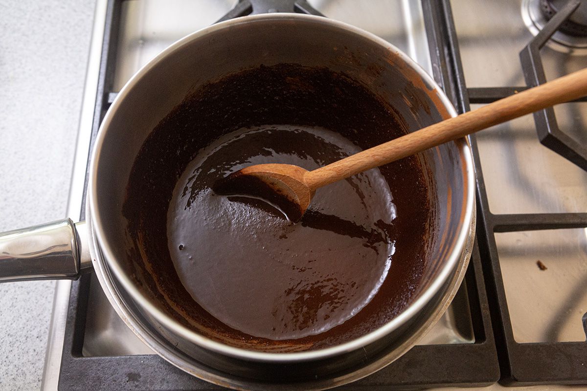 Ingredients melted in a bowl to make an easy brownie recipe.