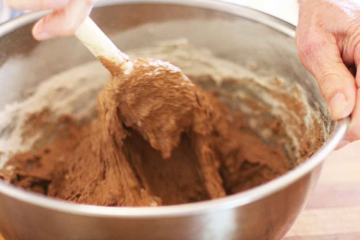 Mixing rye bread dough ingredients in a mixing bowl