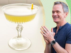 Neil Patrick Harris and a cocktail glass with a drink and garnish