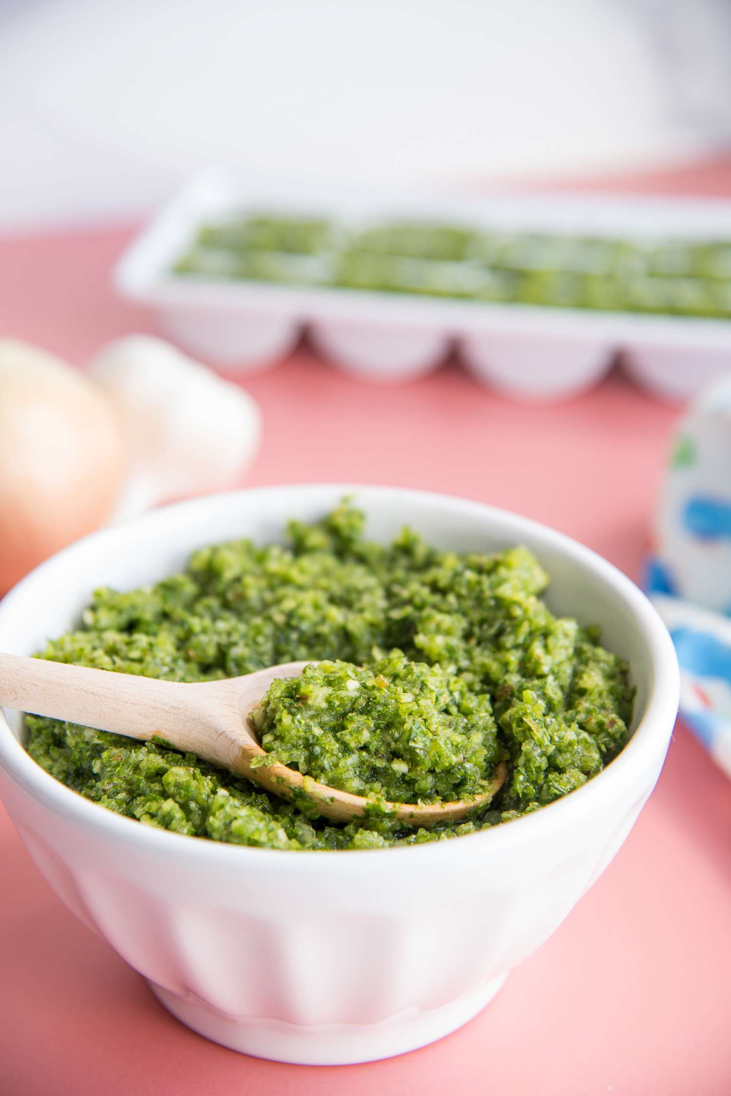 Recaito in a Bowl with Spoon with Recaito in Ice Cube Tray in Background