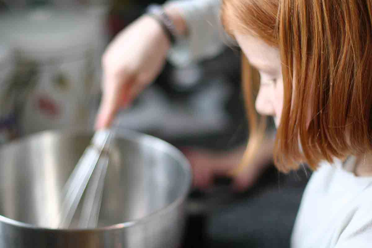 whisking egg mixture for crunchy french toast
