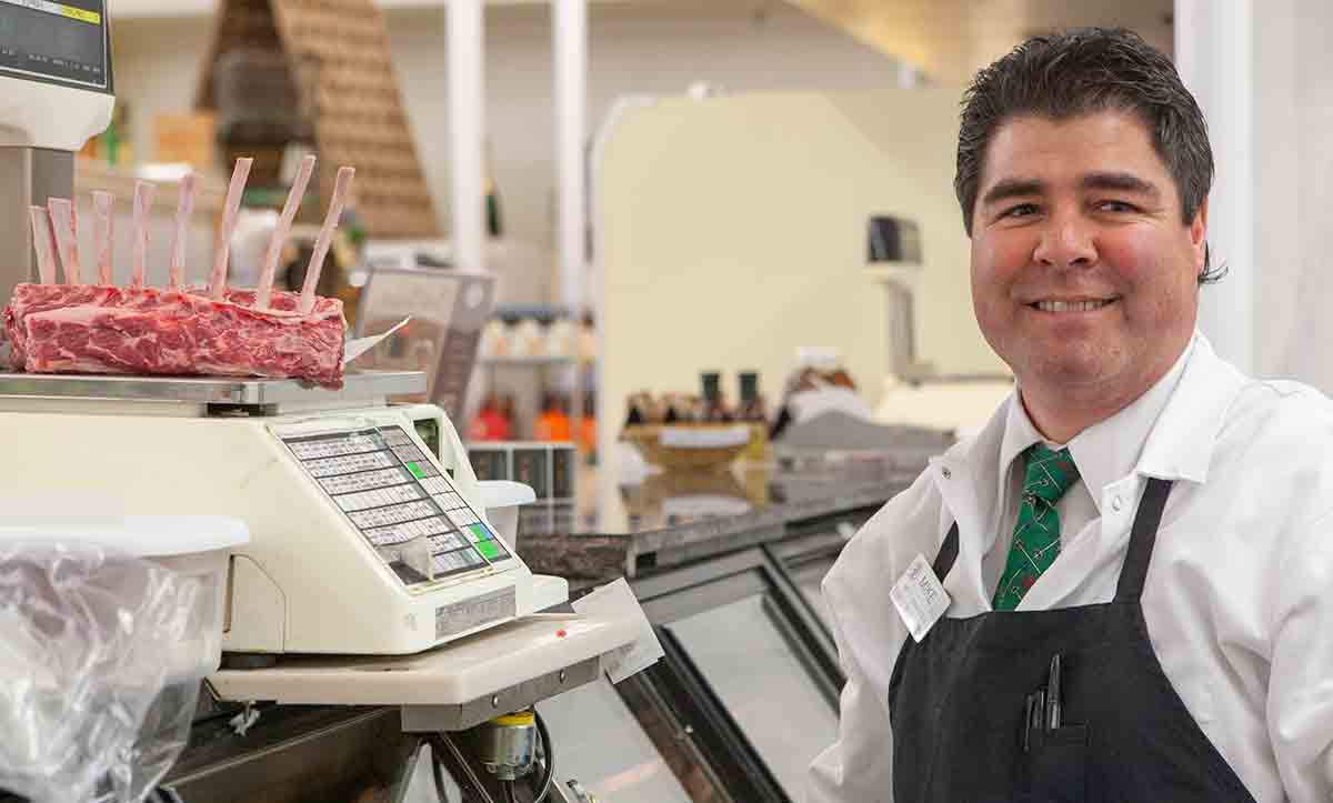 corti brothers butcher Mike Carroll with Frenched rack of lamb