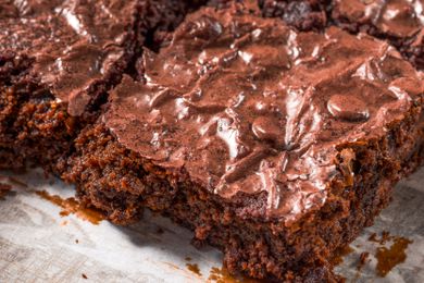 brownie on a piece of parchment paper