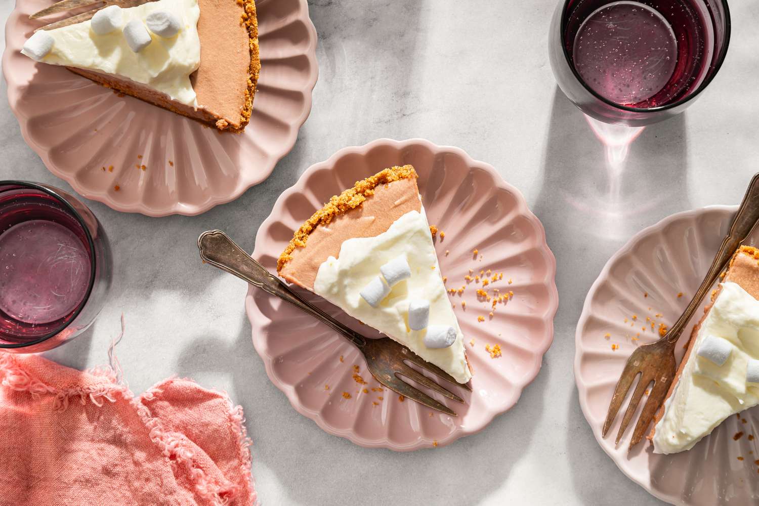 Granny’s Party Pie slices on dessert plates with forks and beverage glasses