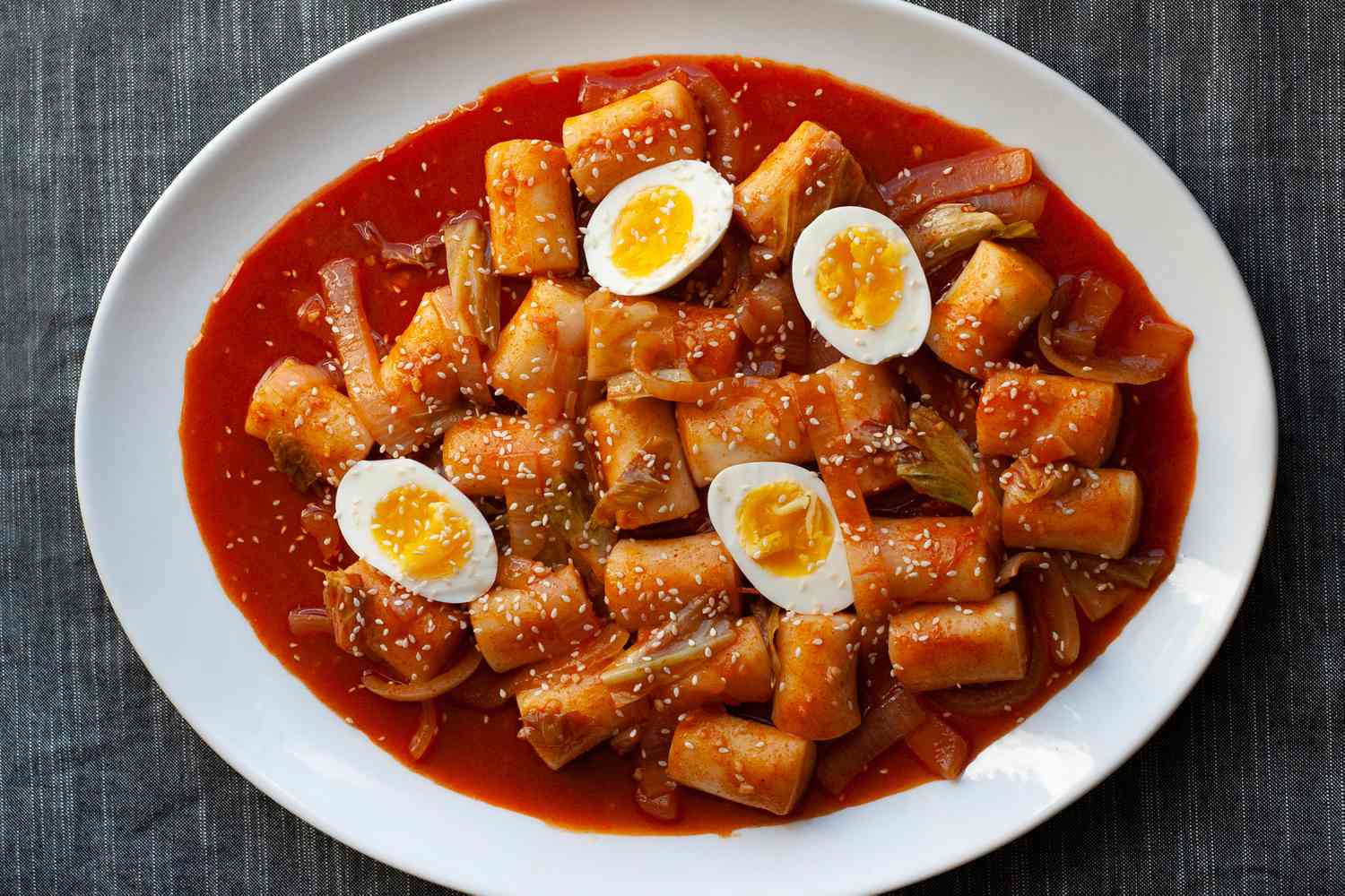 Tteokbokki on white platter.