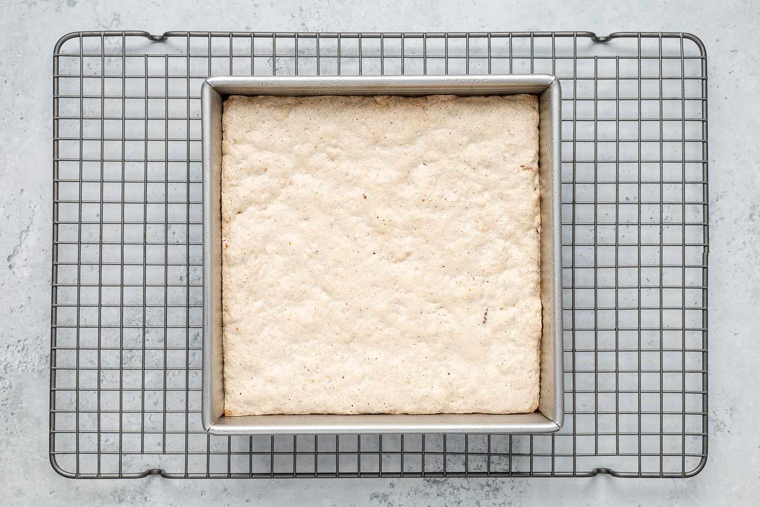 Ritz torte cooling (in pan) on a wire cooling rack